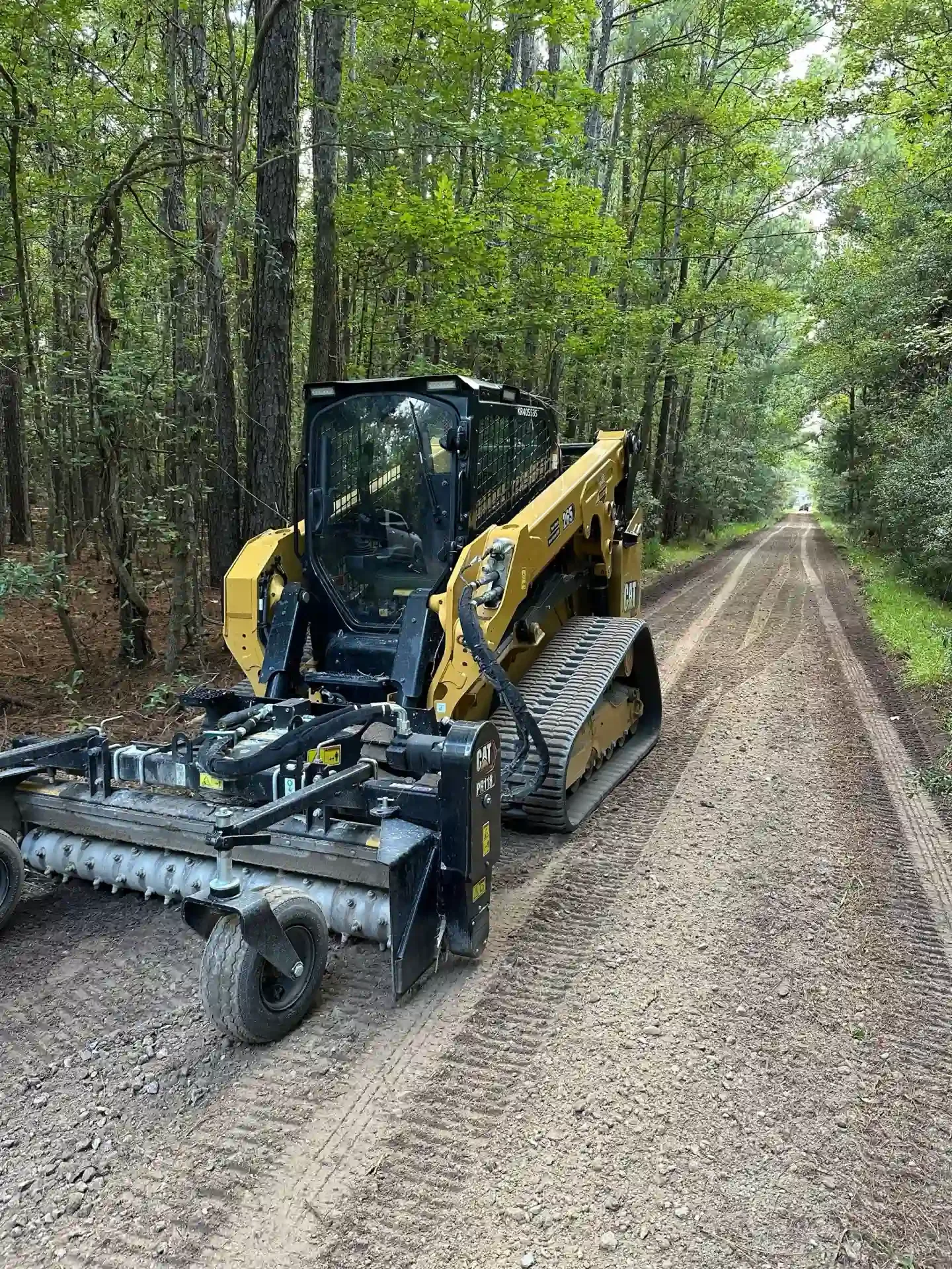 CAT 265 Power Rake Long Dirt Road Pine Woods Morehead City