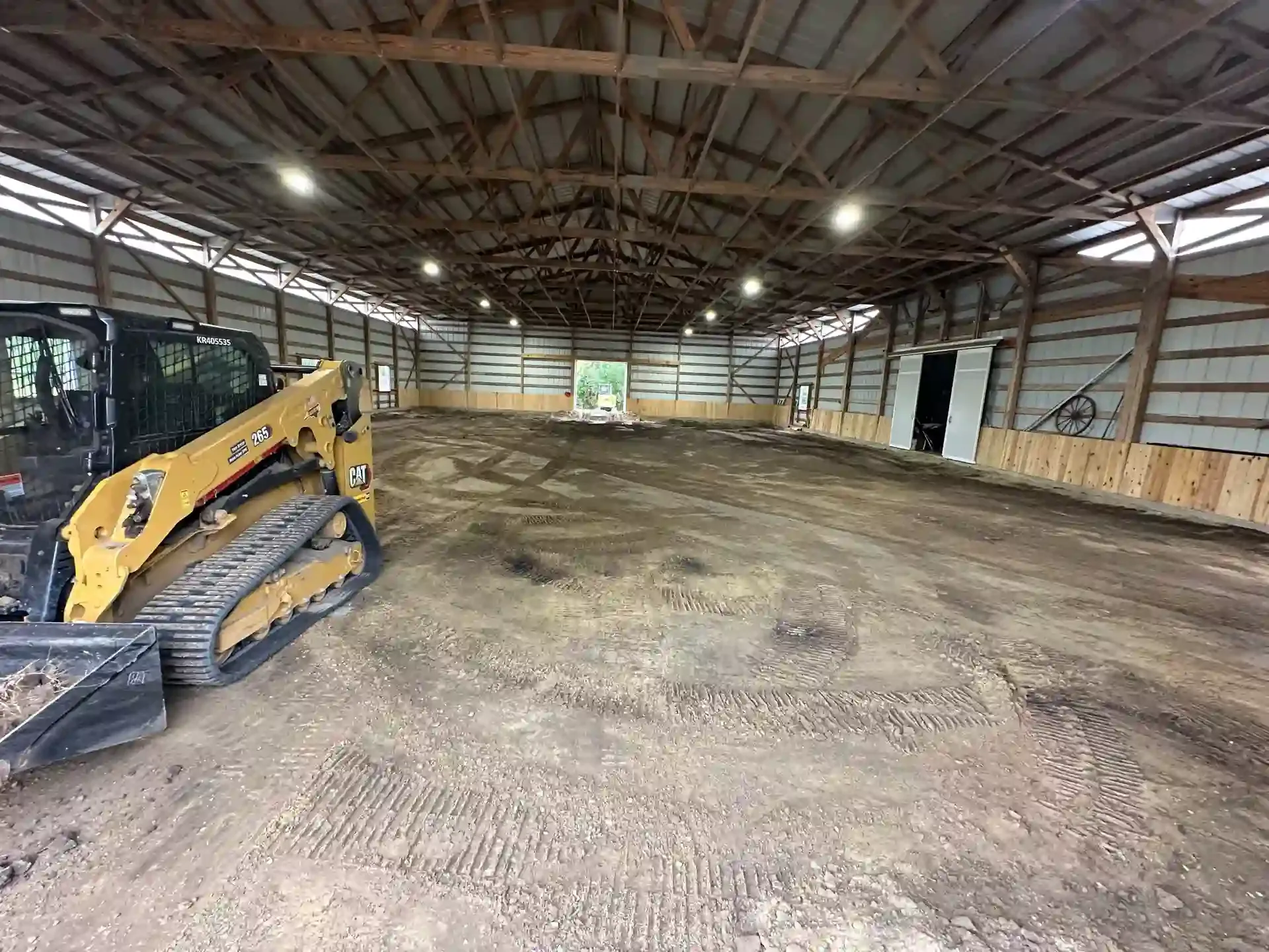 CAT 265 Track Loader Grading Indoor Riding Arena Floor Beauf
