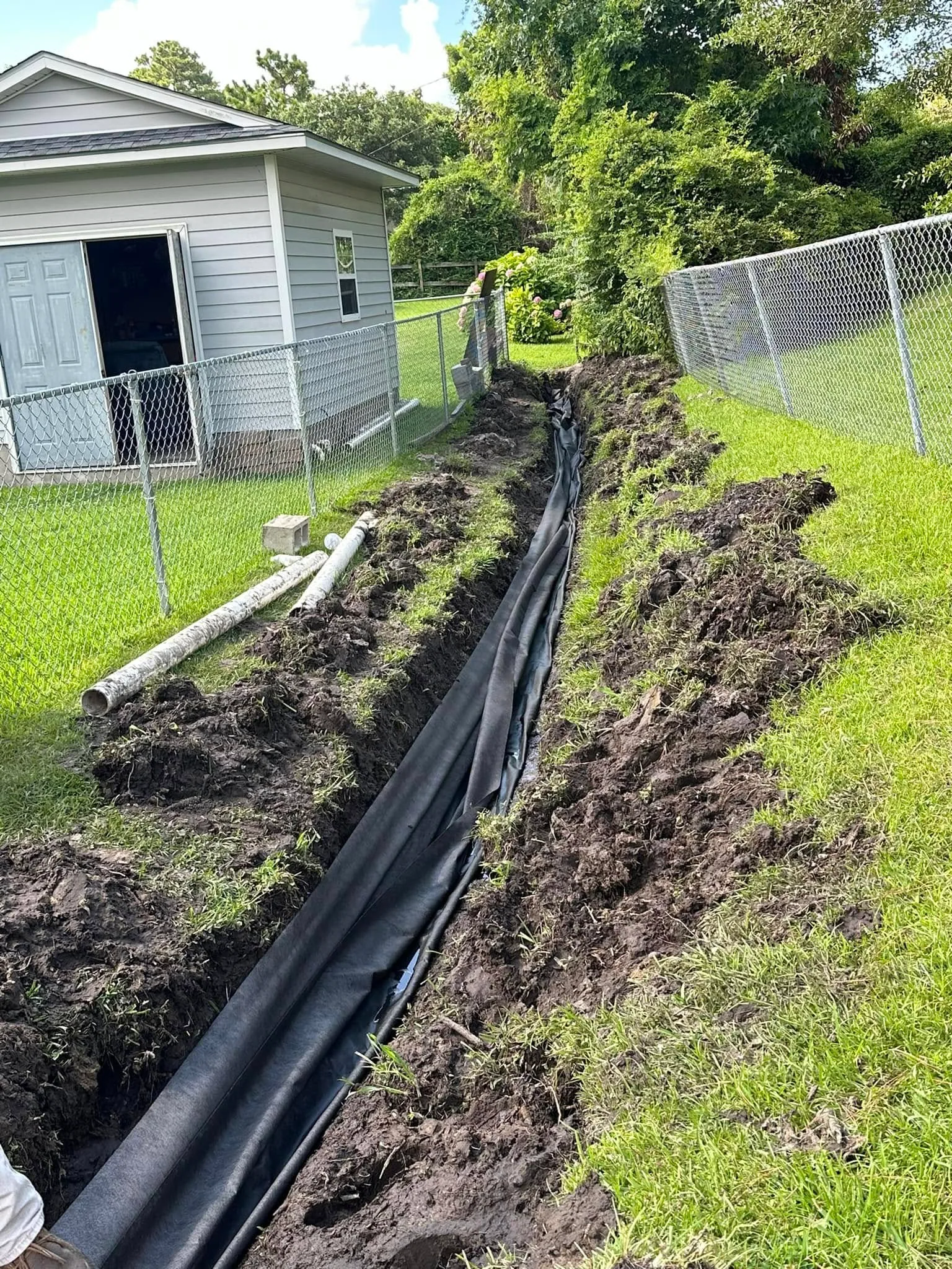 Why Property Owners Choose County Line Grading for French Drain Installation